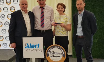0264890_Tim___Kathleen_Regan_pictured_receiving_their_award_from_John_Sheehy_Blas_na_hEireann_and_Thomas_Gersbach__Alert_Packaging.jpg