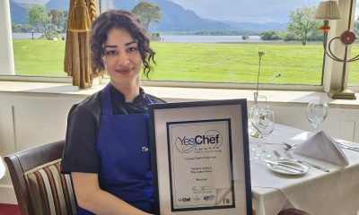 0278633_Tamara_with_award_and_lake_view.jpg