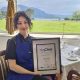 0278633_Tamara_with_award_and_lake_view.jpg